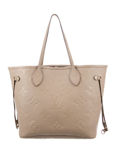 louis vuitton monogram empreinte neverfull|louis vuitton neverfull wallet.